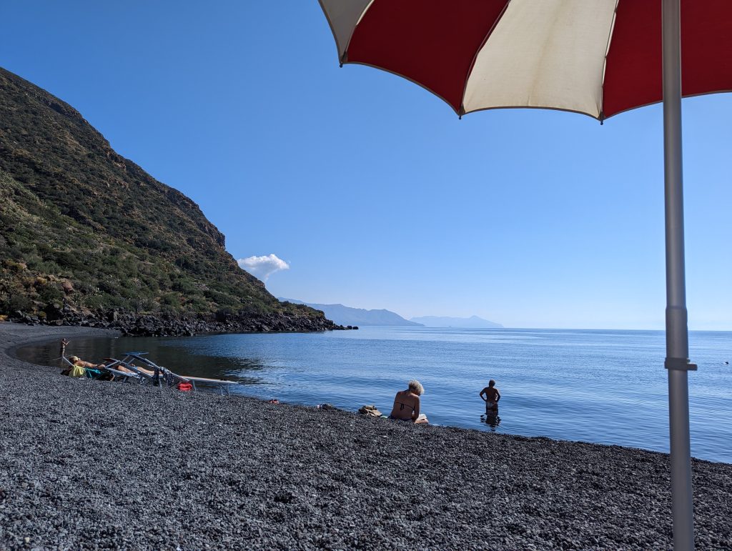 Rinella, Salina beach picture with umbrella
